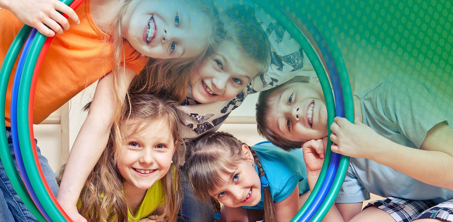 Five children look through colorful hoops © anatolis/istockphoto