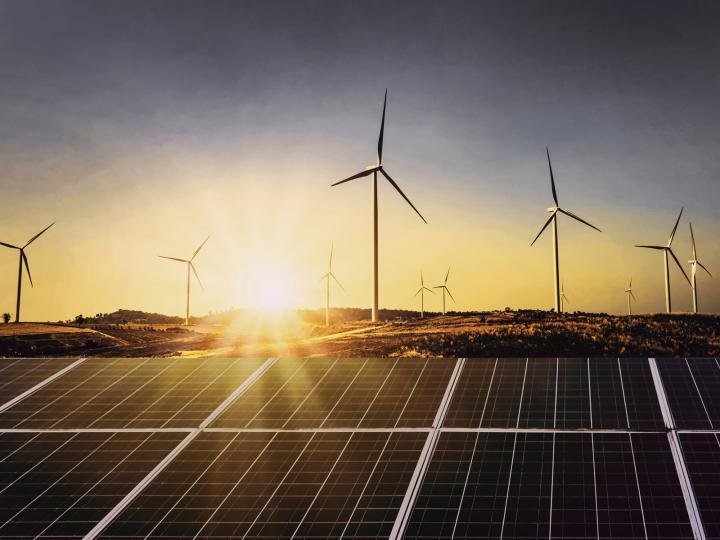 Photovoltaic plant and wind turbines in the evening light © lovelyday12/istockphoto